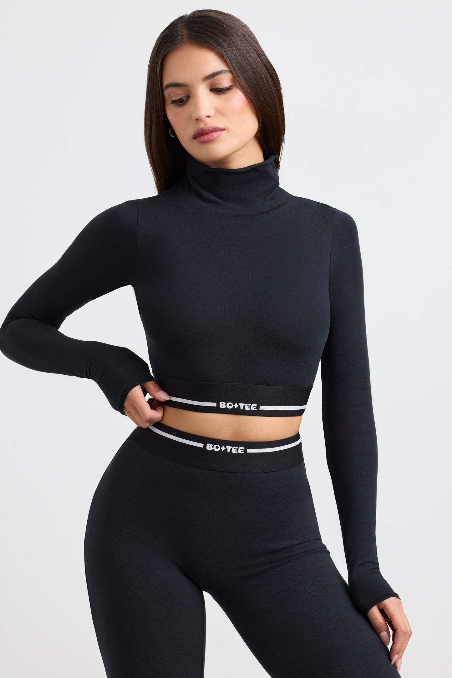 Stretch Cotton Jersey Backless Turtleneck Long-Sleeve Crop Top in Black